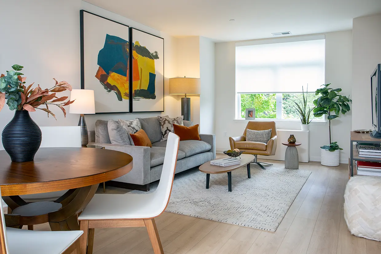 Apartments Feature Wide Plank Flooring & White Shades Throughout