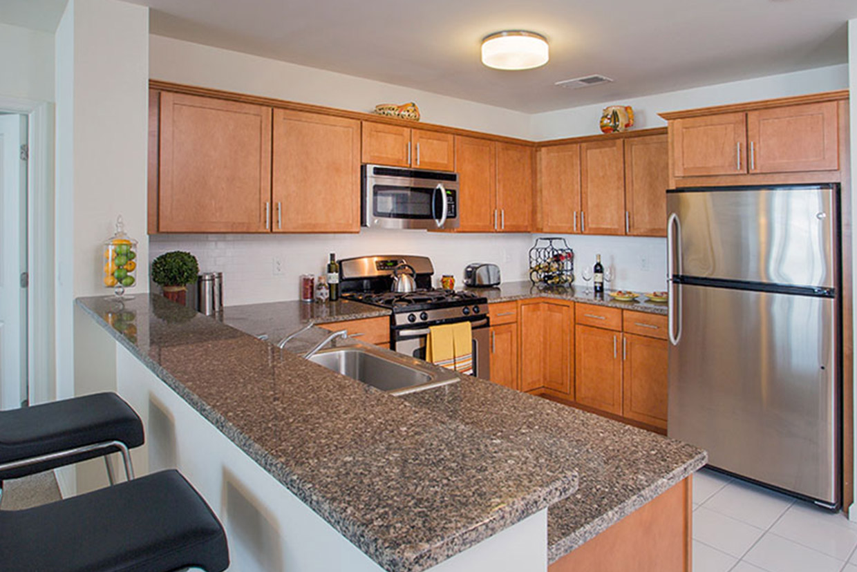 Kitchen with Granite Countertops and Stainless Steel Appliances